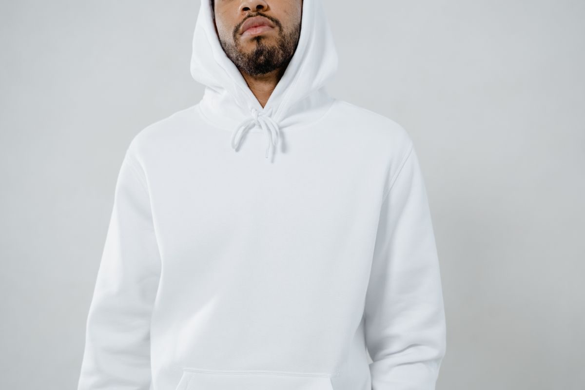 Plain white pullover hoodie with no branding