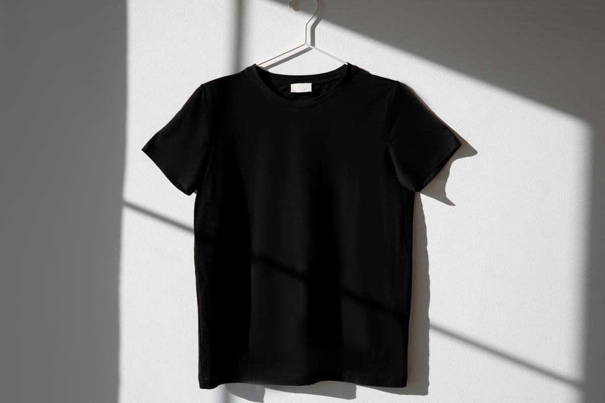 Blank black shirt on a hanger, the surface a player name is applied to