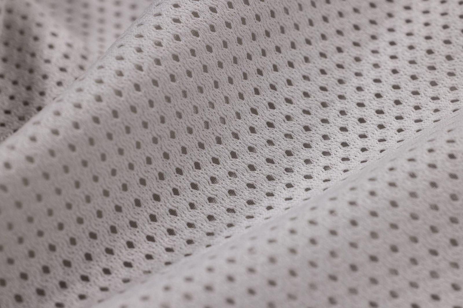 Close-up of breathable technical mesh fabric