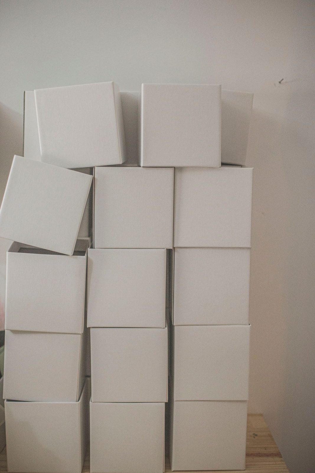 Stack of plain unbranded cardboard shipping boxes
