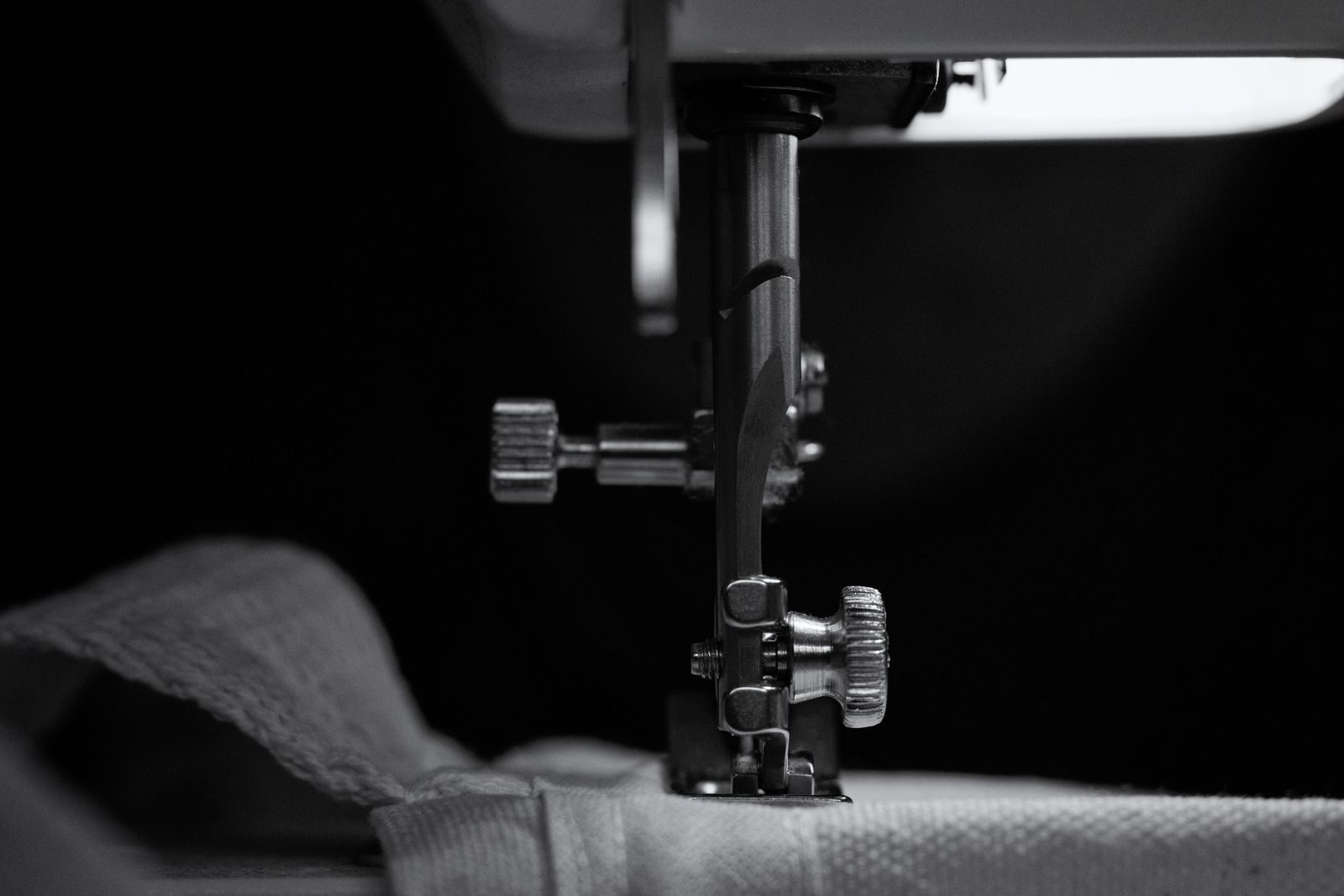 Close-up of machine stitching, the technique used to apply logos