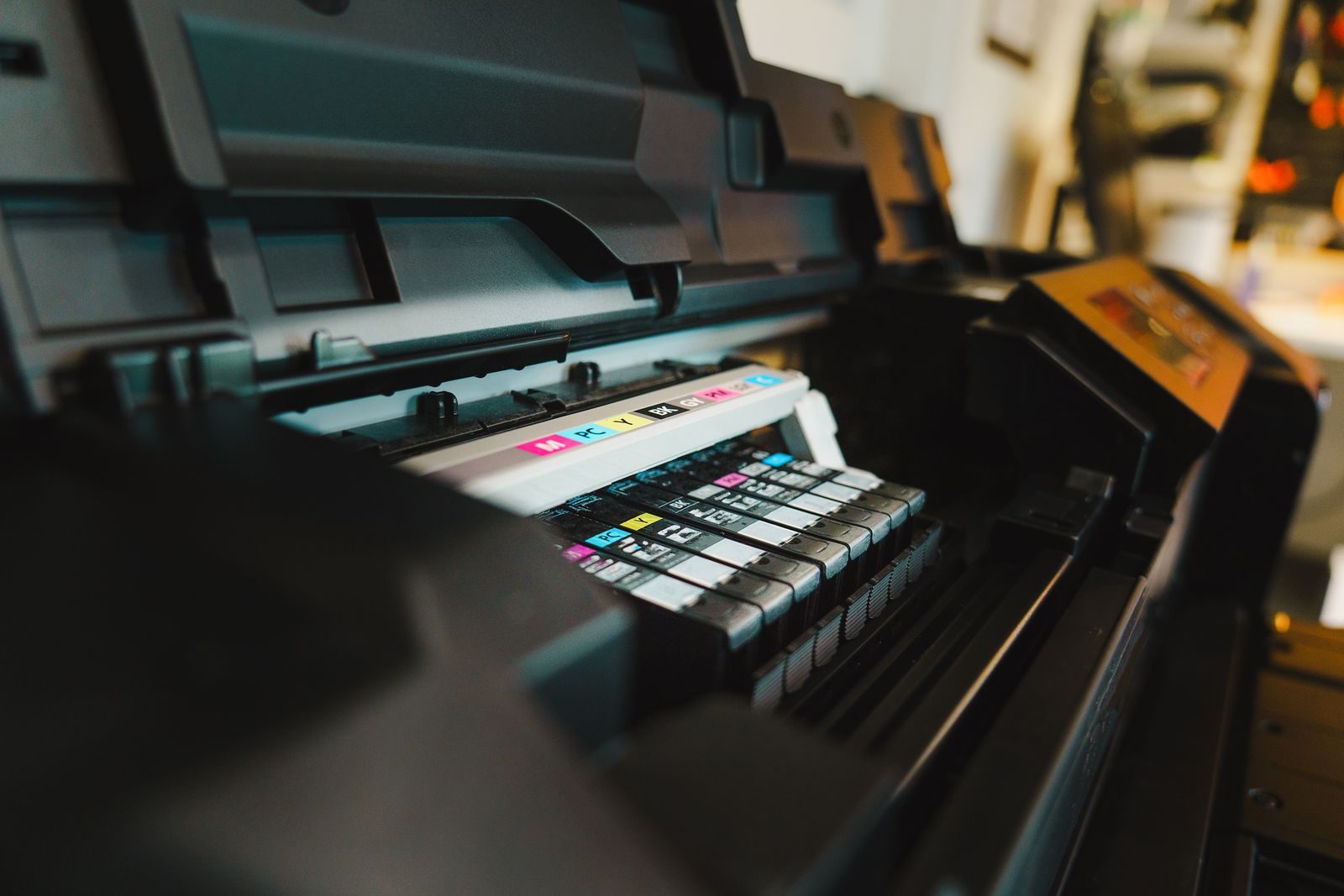 Wide-format printer with color ink bays
