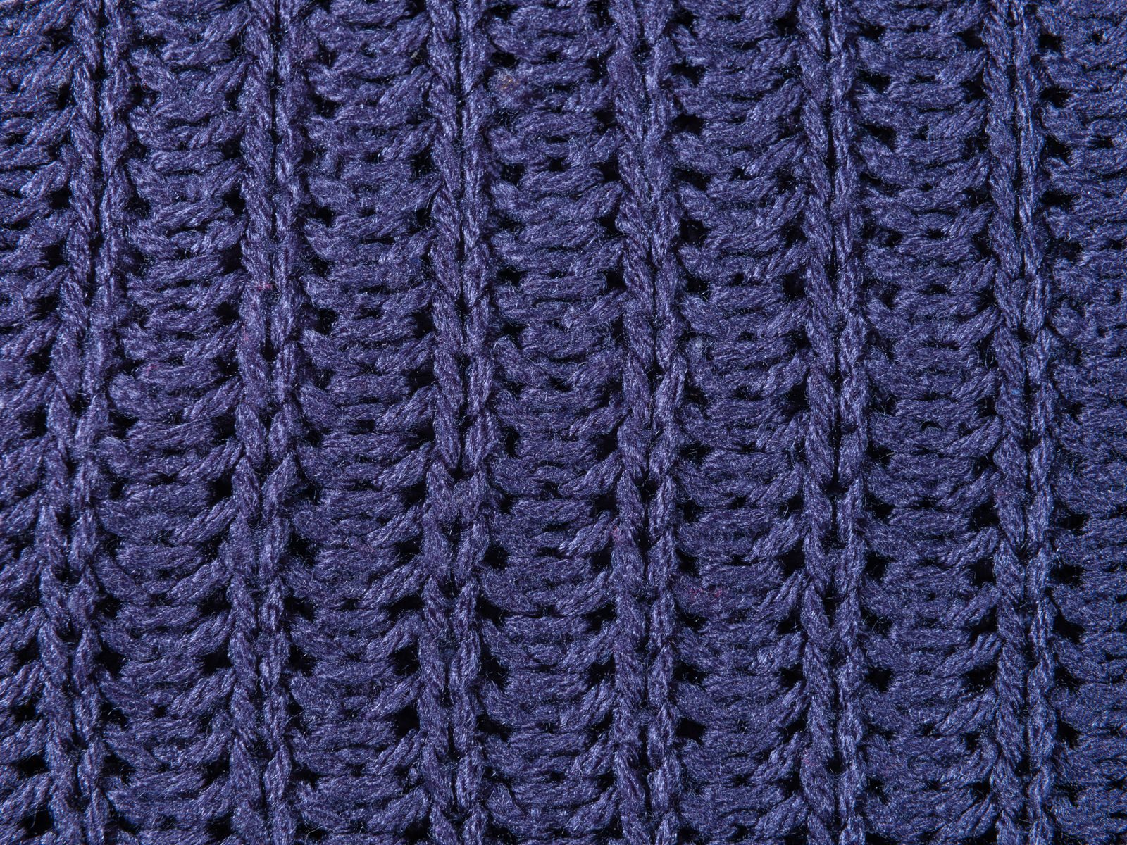 Close-up of navy ribbed knit fabric