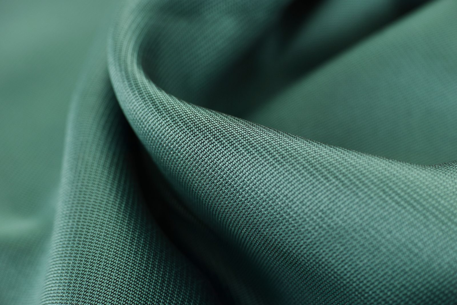 Close-up of woven twill fabric with a fine grid structure